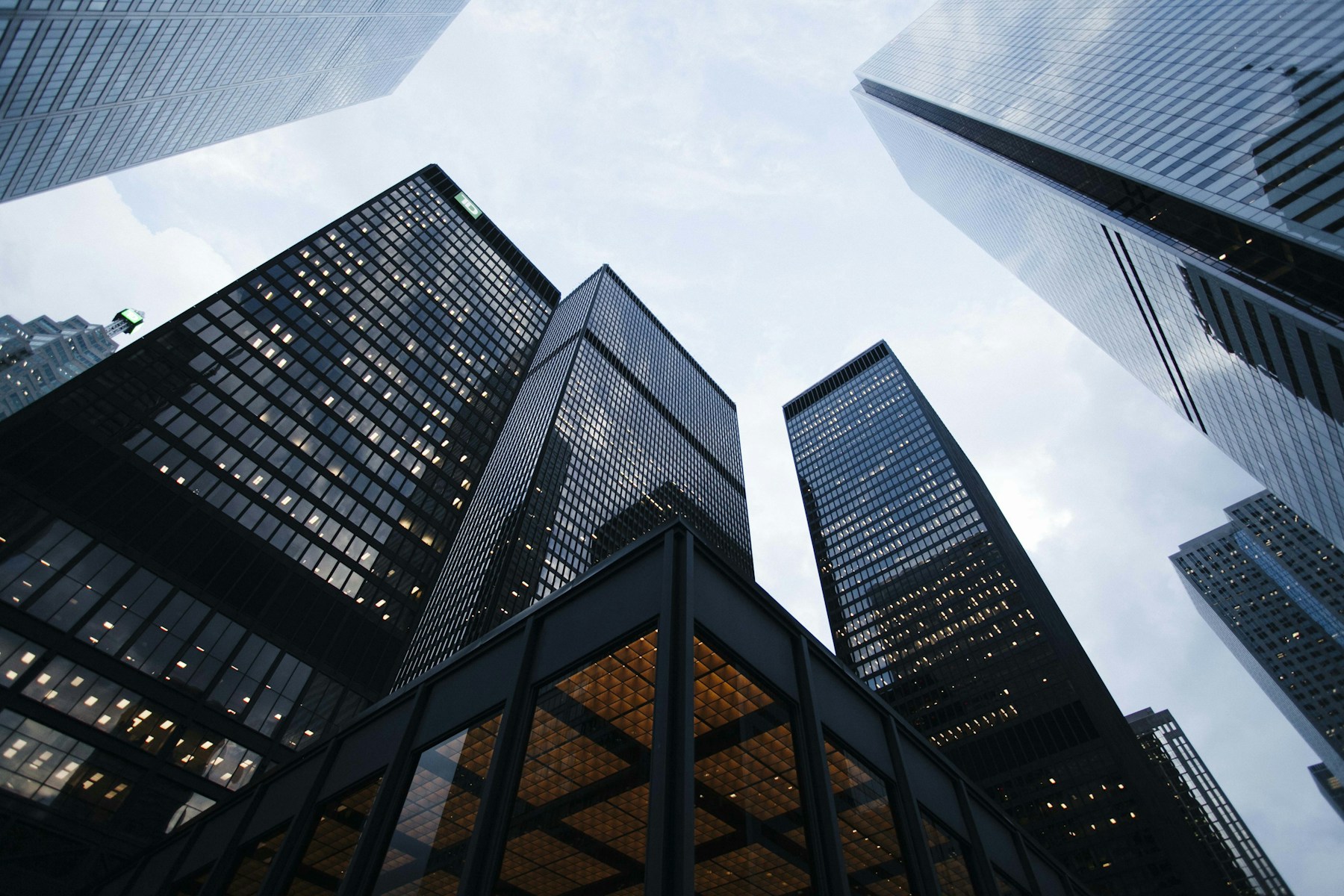 Glass towers rising above a financial district
